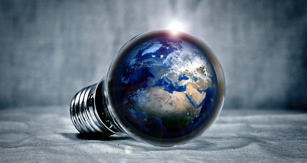 Light bulb containing the globe depicting global growth factor