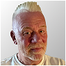 Portrait of a senior man with grey hair and a white beard looking at the camera